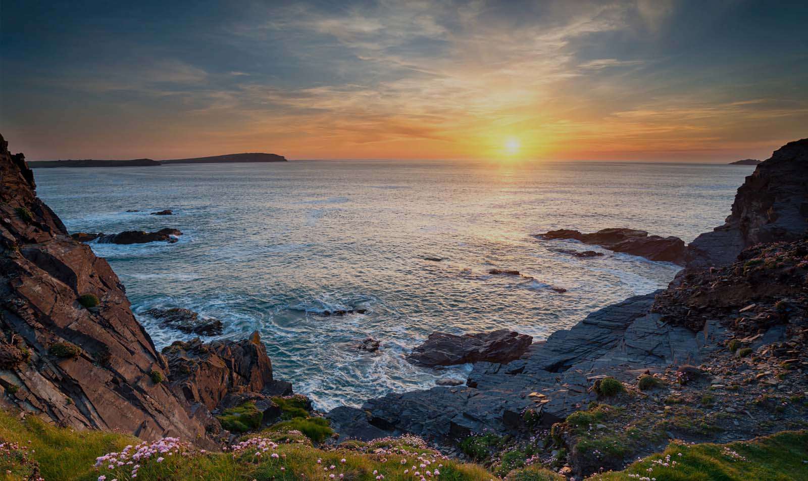Golden-hour light over the Seven Bays coast near Atlantic Bays Holiday Park, Padstow, North Cornwall