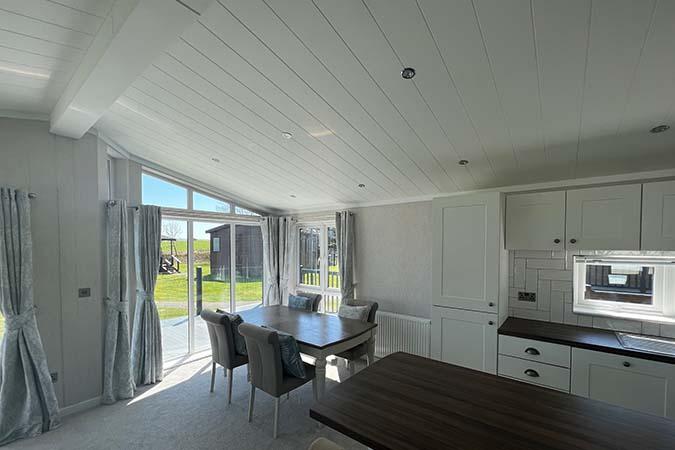 Open-plan lodge living room interior at Atlantic Bays Holiday Park
