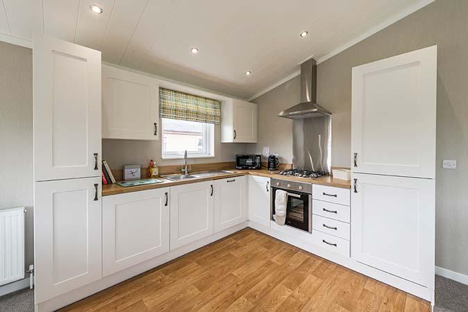 Modern fitted lodge kitchen at Atlantic Bays Holiday Park