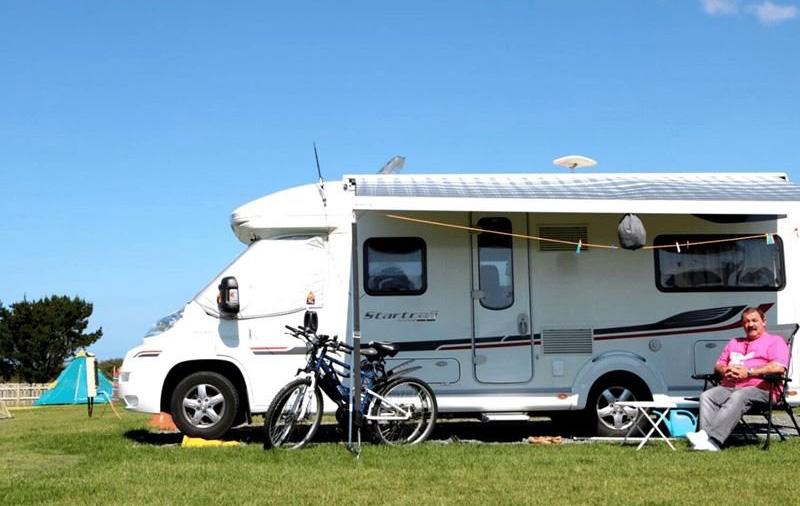 Touring caravan and motorhome pitches in open countryside at Atlantic Bays, St Merryn